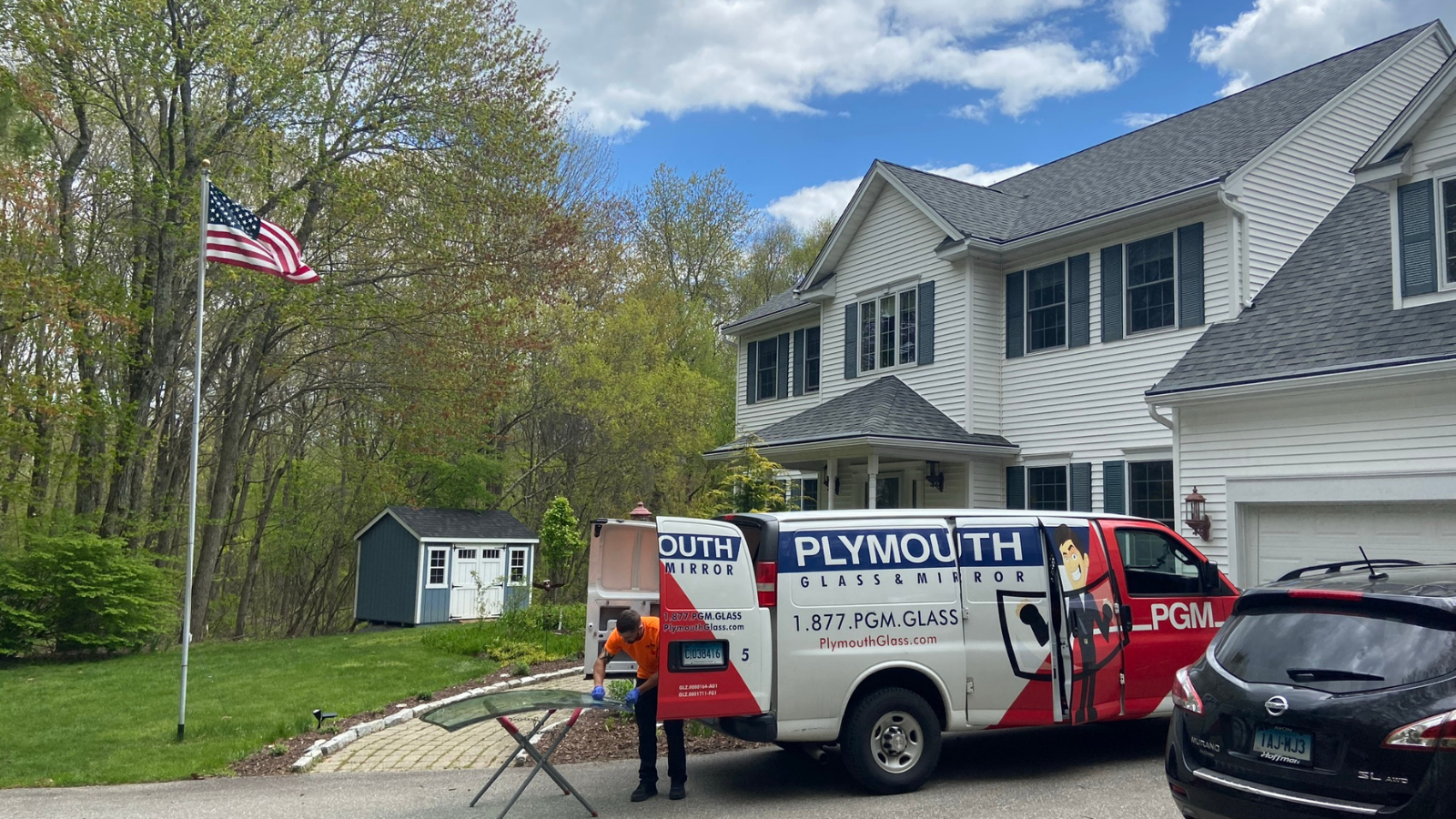plymouth glass mobile windshield repair crew at a customer's home