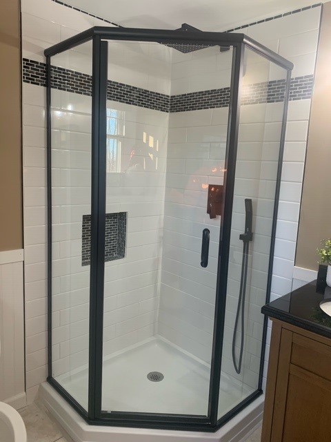 black framed glass shower door by Plymouth Glass