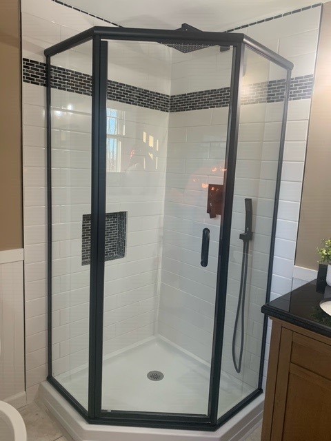 black framed glass shower door by Plymouth Glass